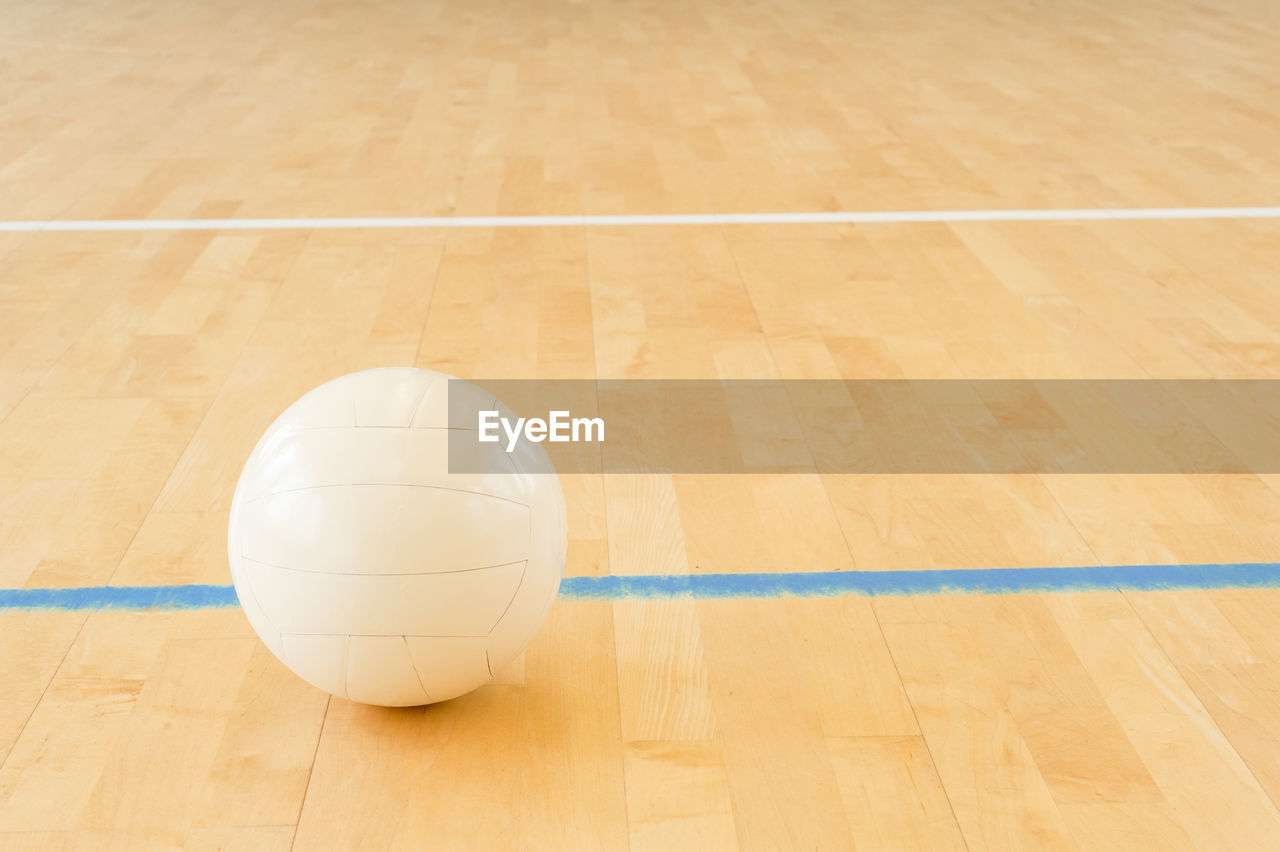 Close-up of on volleyball on court