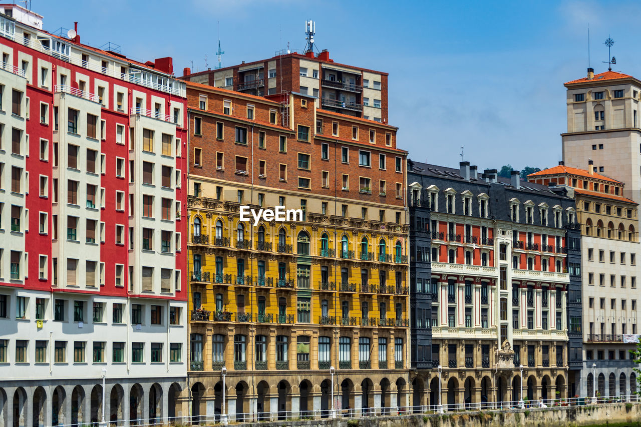 buildings in city against sky