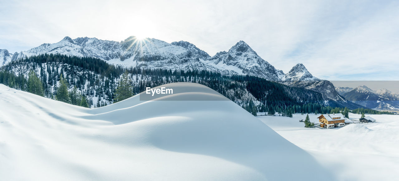 Winter scenery with austrian alps snow-covered. snowdrifts in ski resort in ehrwald, tyrol, austria.