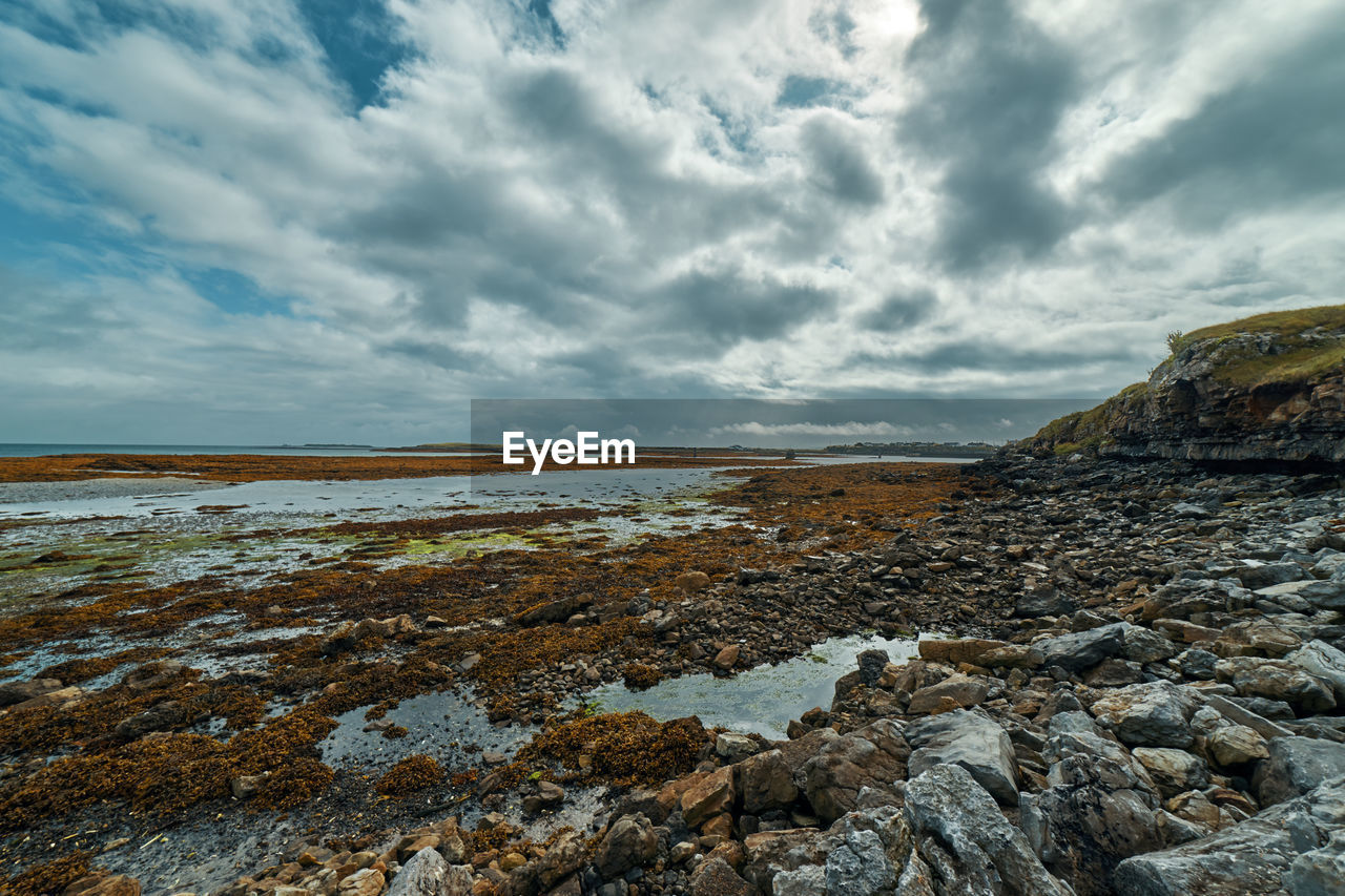Scenic view of the rocky coast of inishmore during low tide