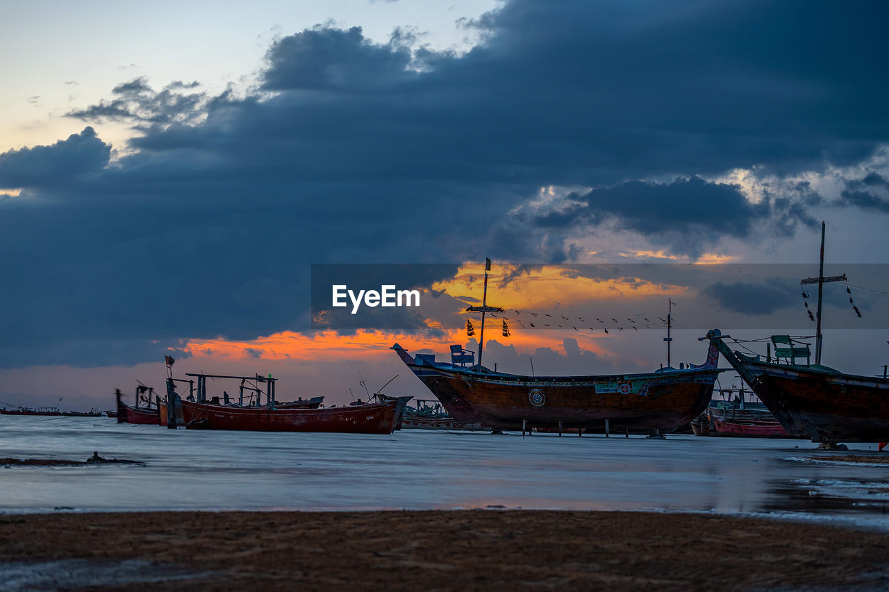 Sunset view with cloudy sky at gadani beach with dhow boat