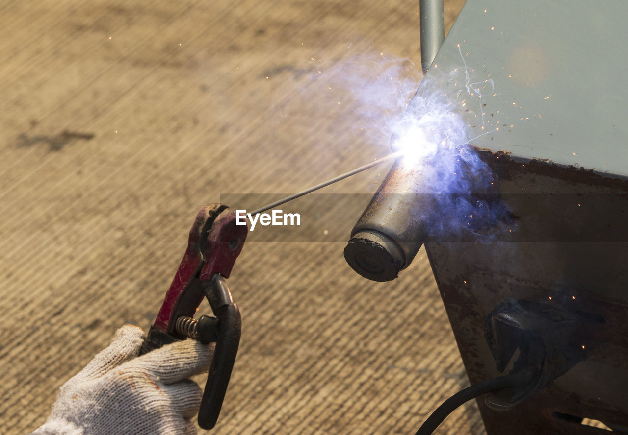 Welder working on a factory