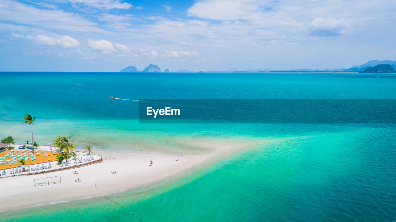 high angle view of people on beach against sky