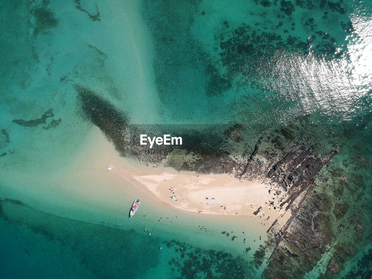 Aerial view of boat moored at sea