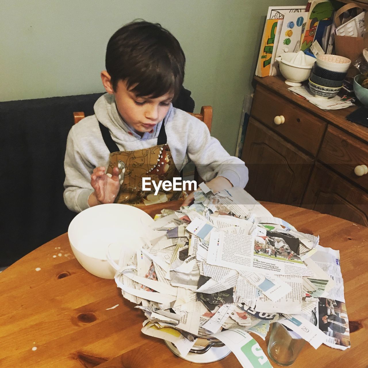 BOY SITTING ON SOFA