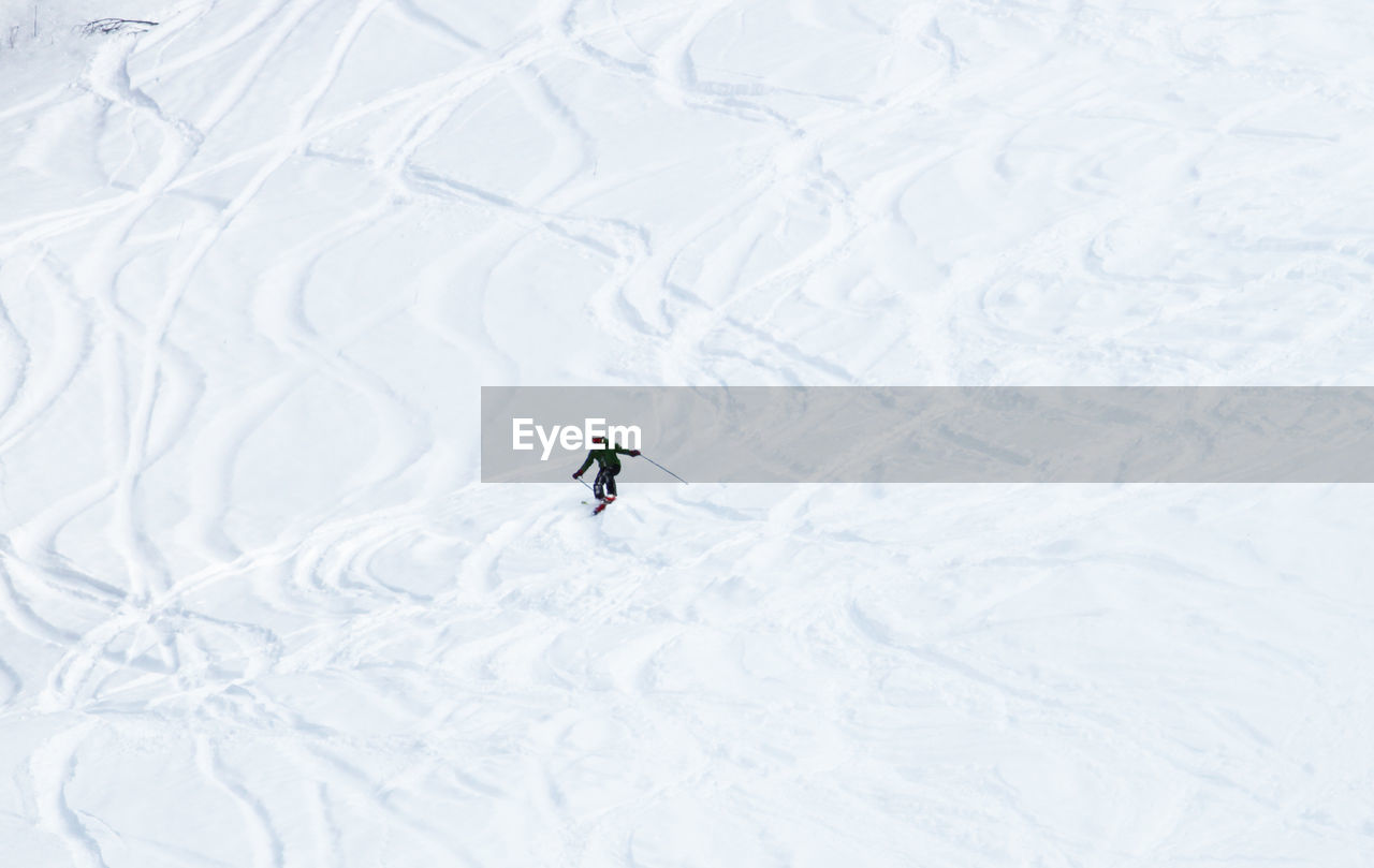 High angle view of person skiing on snow