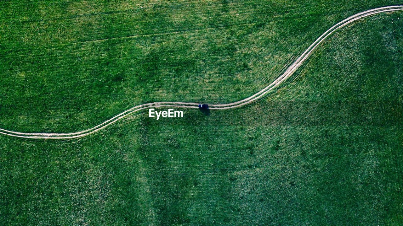 Aerial view of footpath amidst field