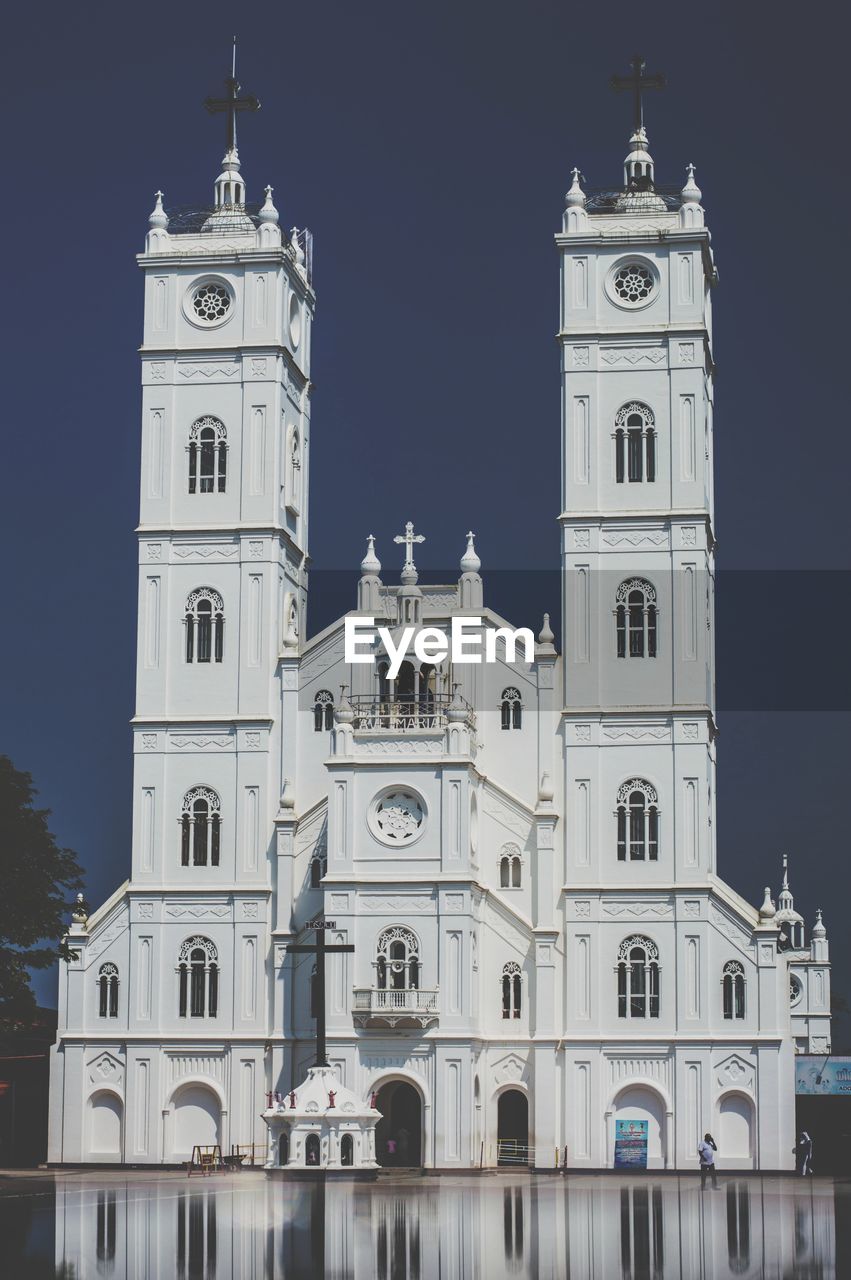 LOW ANGLE VIEW OF CLOCK TOWER