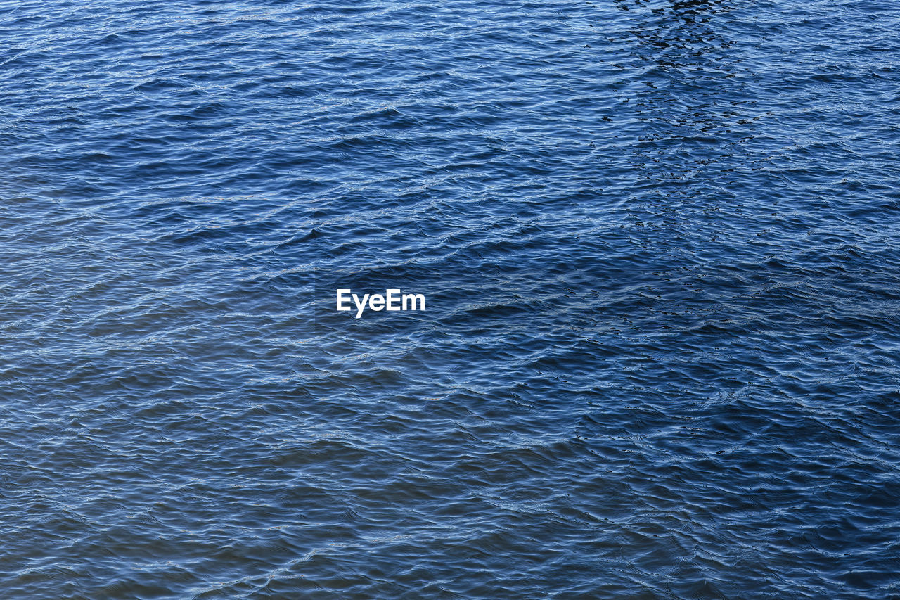 water, full frame, backgrounds, rippled, no people, sea, wave, horizon, ocean, beauty in nature, pattern, waterfront, day, blue, high angle view, nature, tranquility, wind wave, scenics - nature, wave pattern, azure, textured, shore, outdoors, reflection, tranquil scene