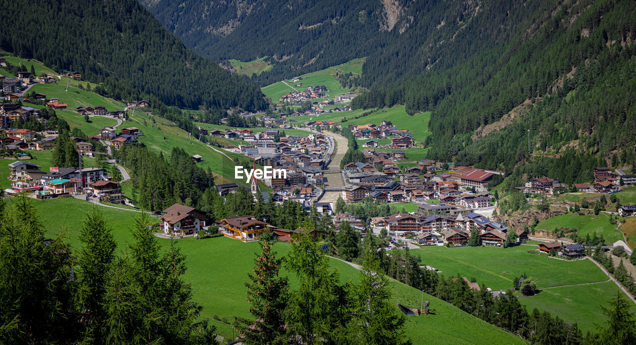 high angle view of townscape and mountains