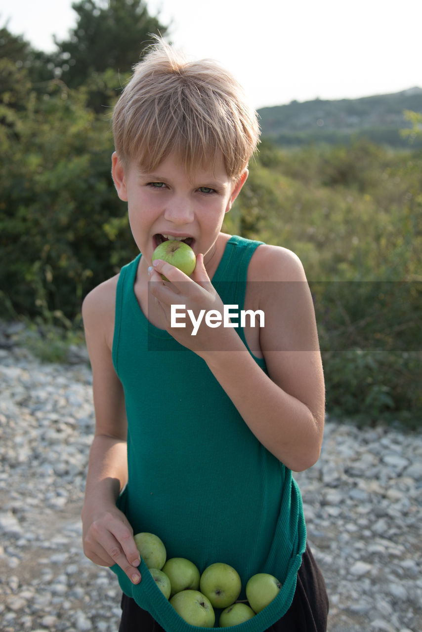 Boy holding ice cream