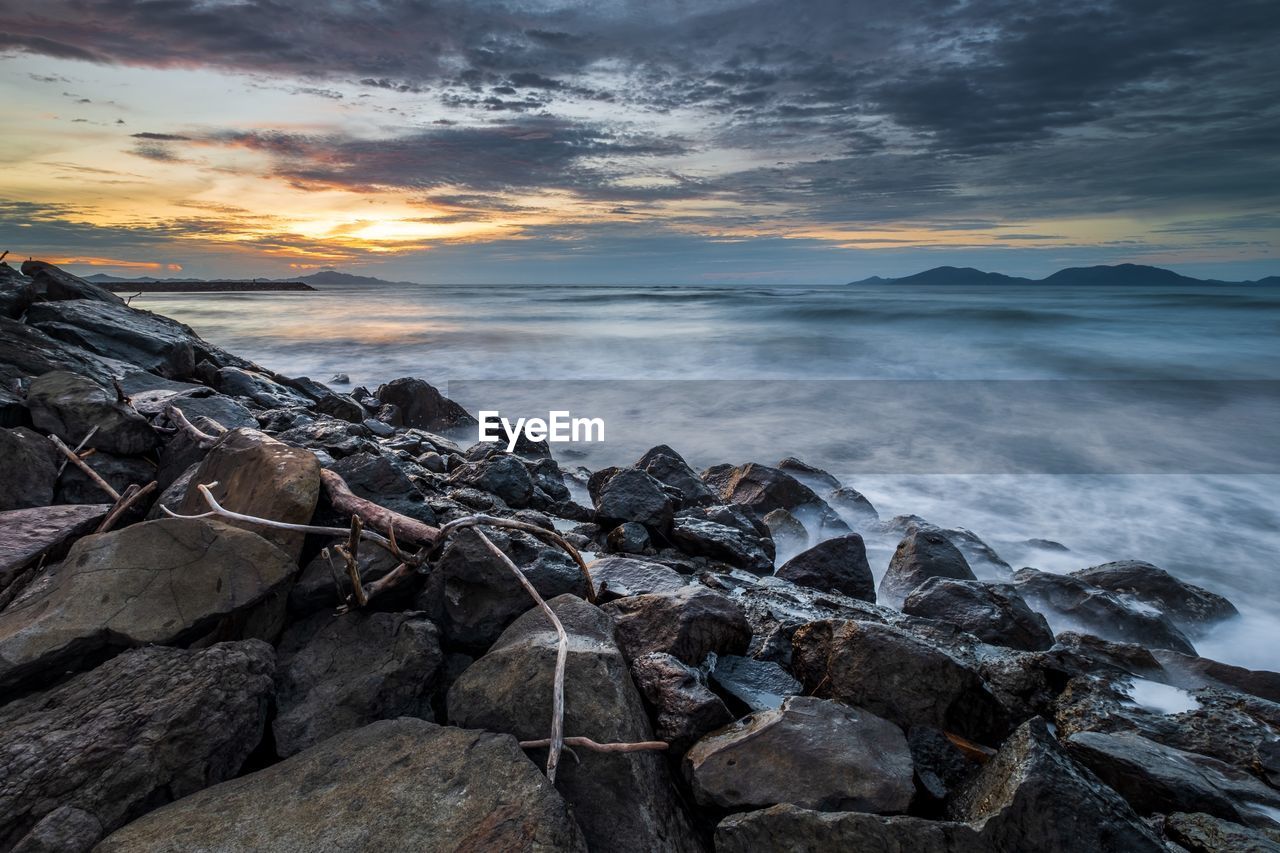 Scenic view of sea against sky during sunset