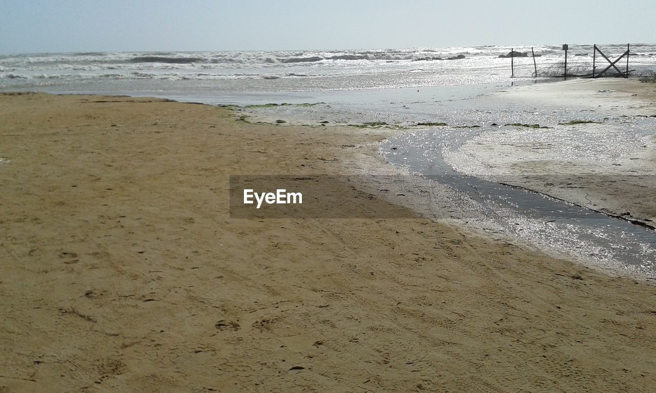 SCENIC VIEW OF CALM SEA AGAINST SKY