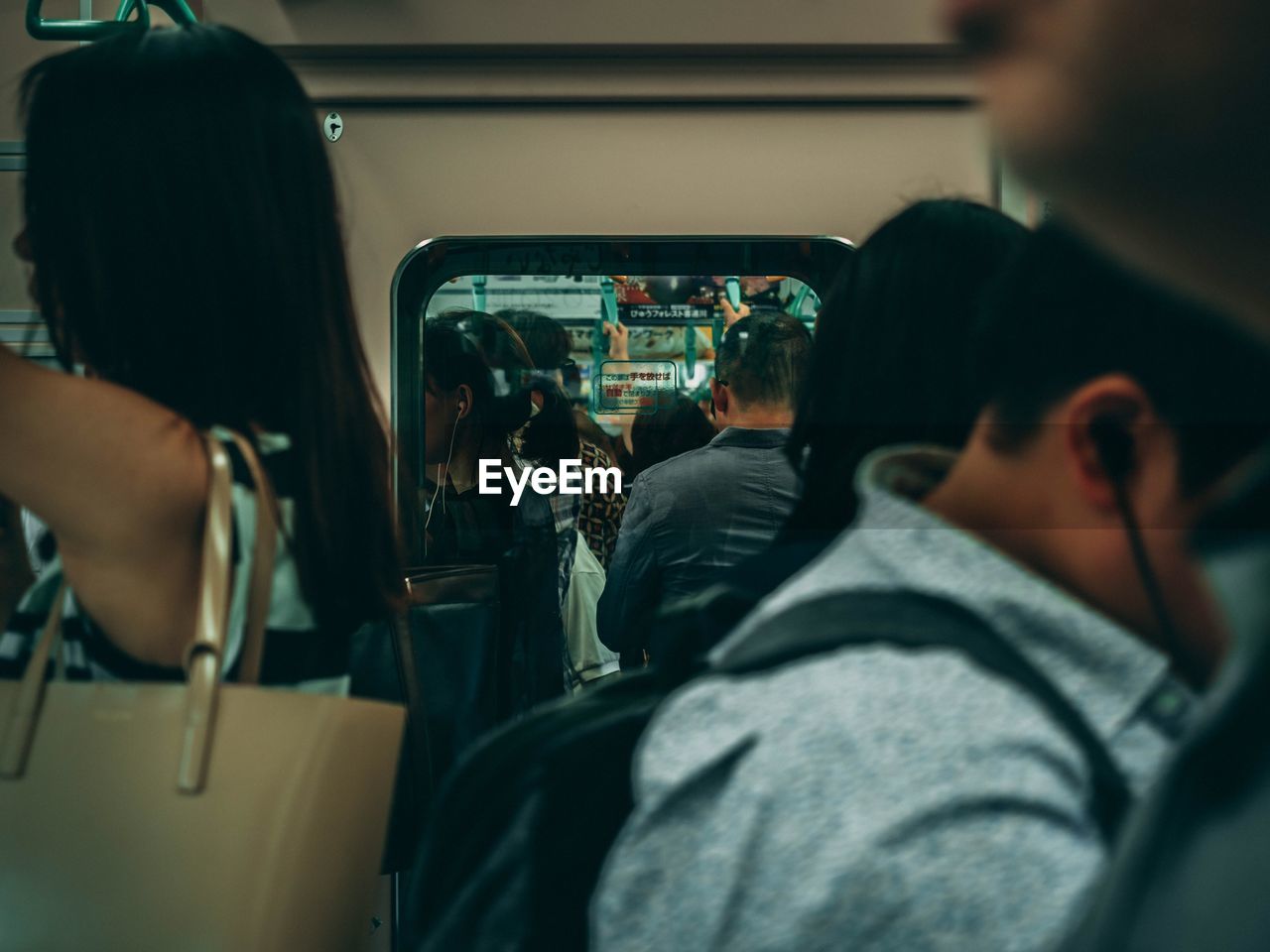 People standing in train