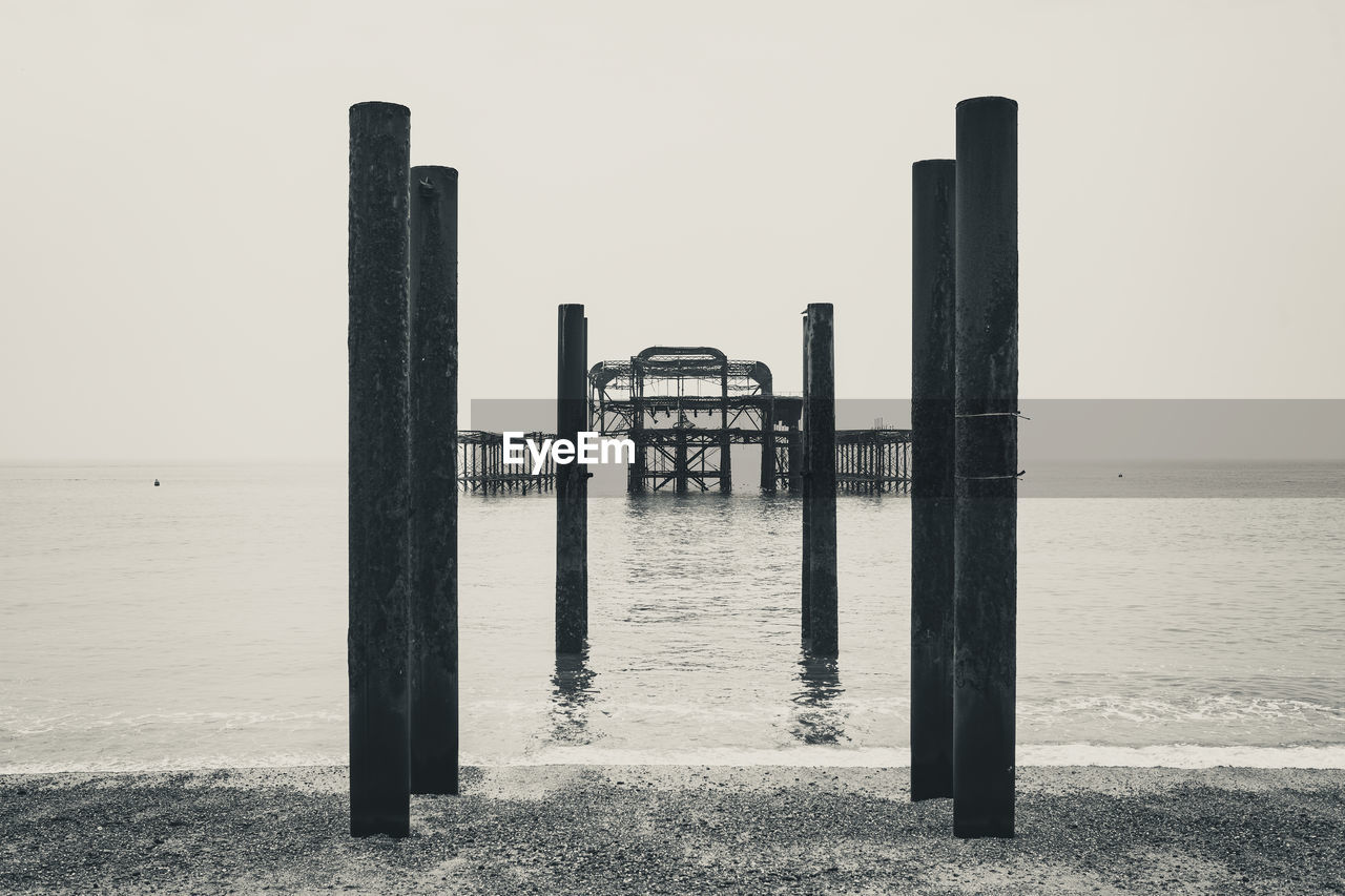 PIER OVER SEA AGAINST SKY