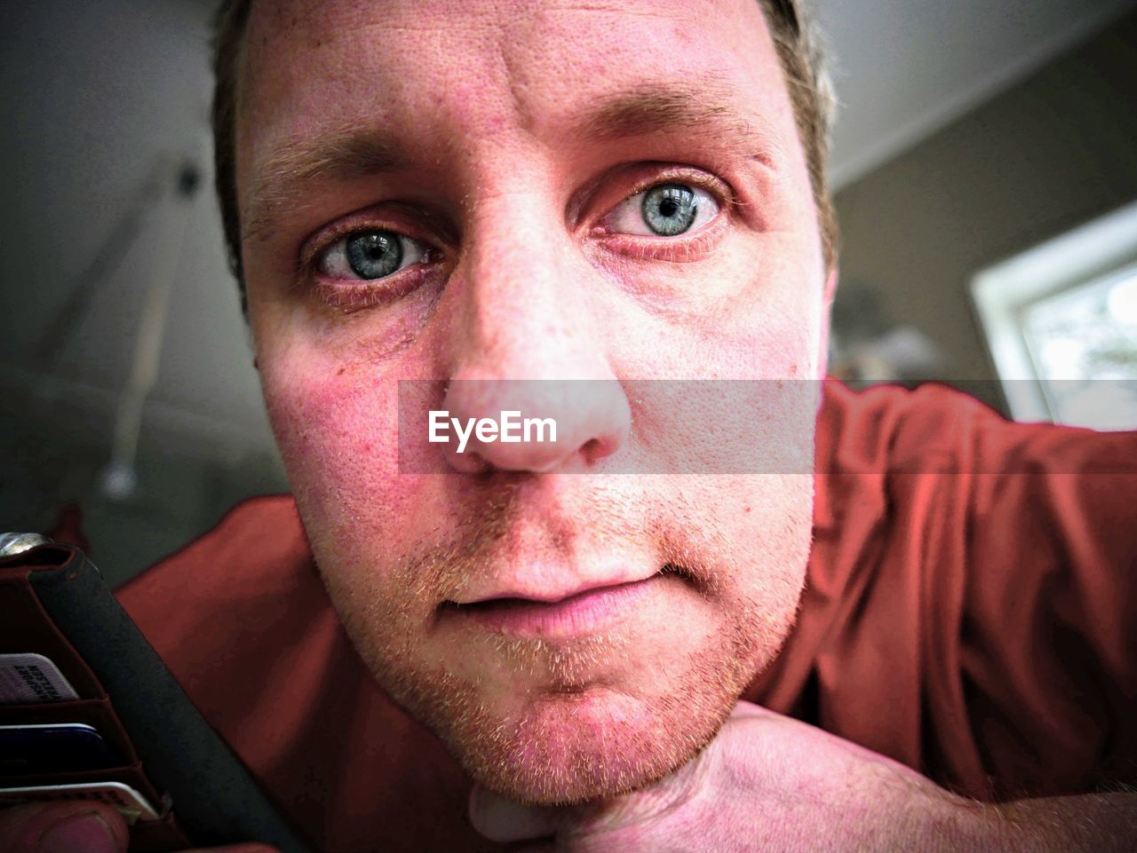 Close-up portrait of man at home