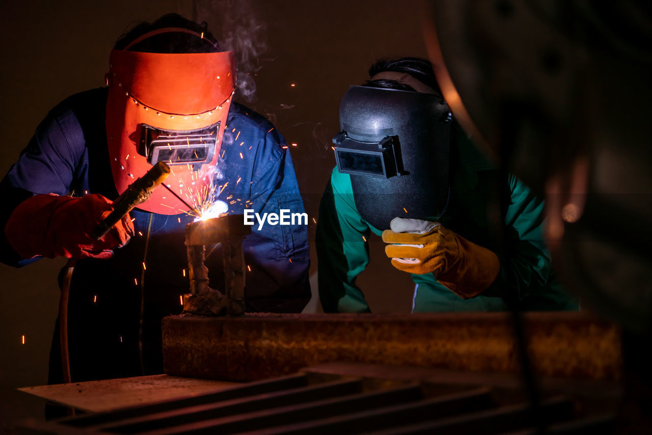 MAN WORKING IN FACTORY