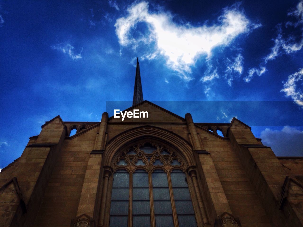 LOW ANGLE VIEW OF CHURCH AGAINST CLOUDY SKY