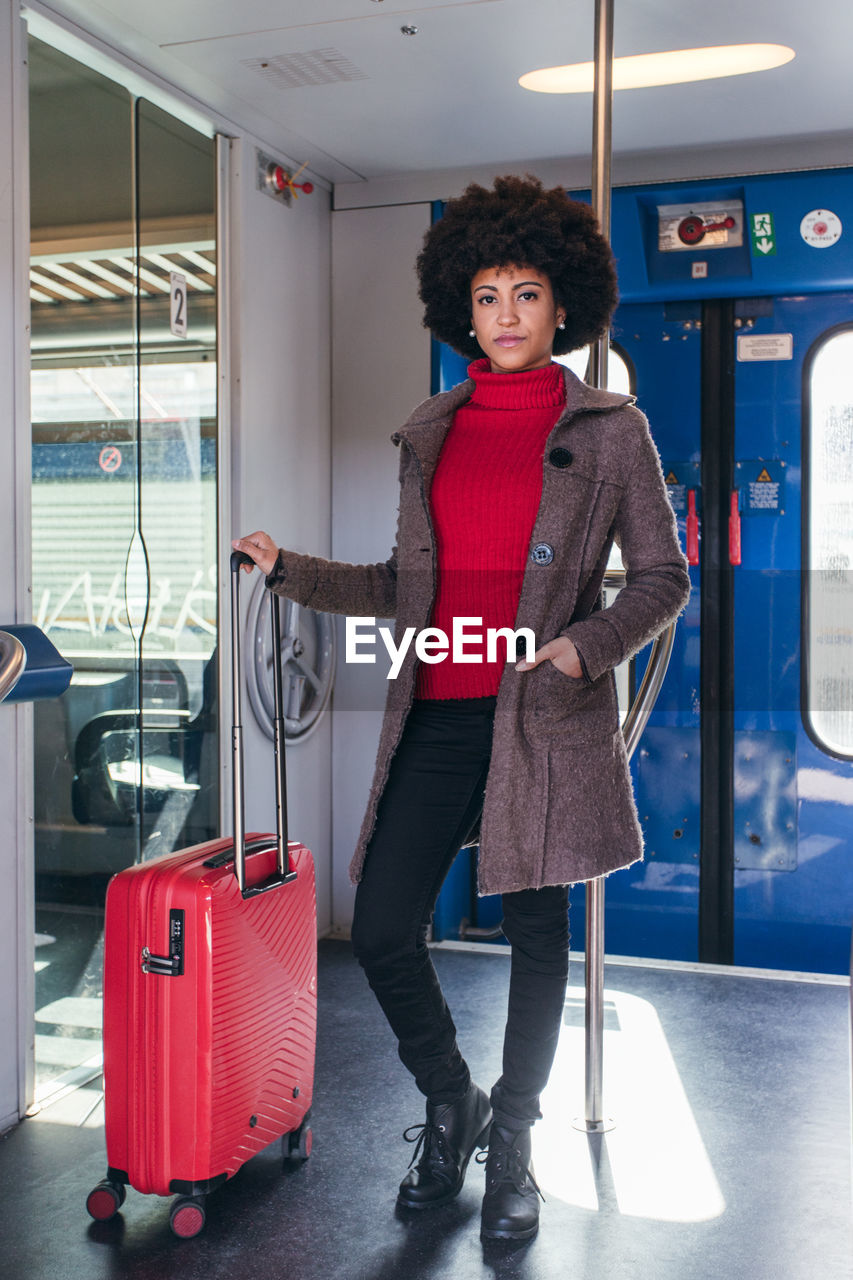 Elegant woman going for business trip on train