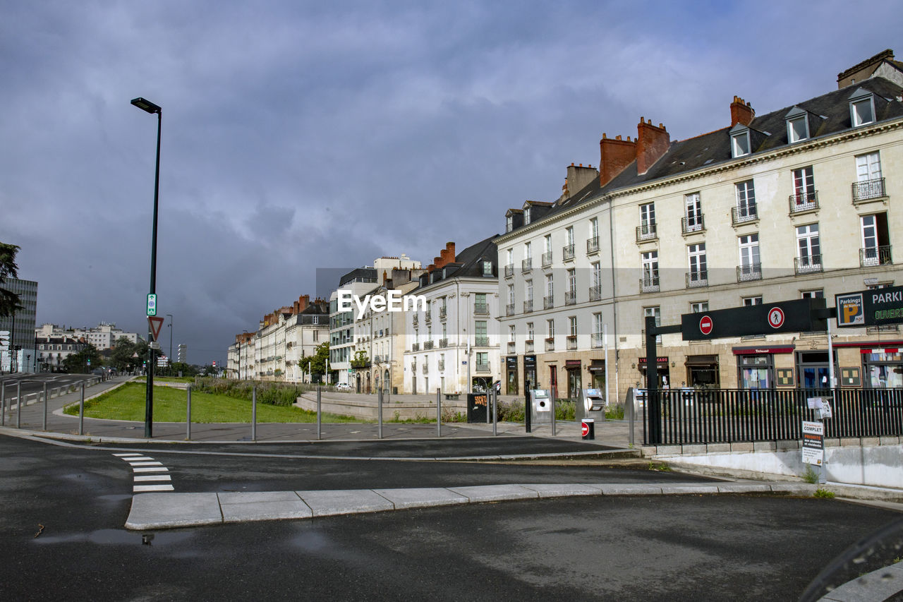 STREET AND BUILDINGS AGAINST SKY