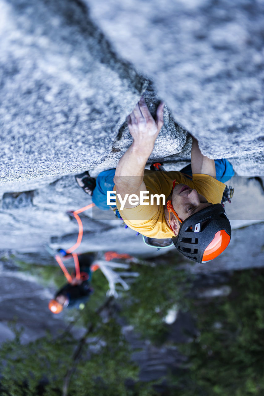 Man lead rock climbing trad on granite squamish stawamus chief