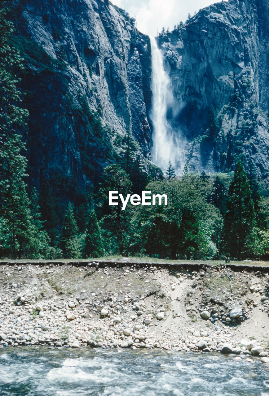 scenic view of river amidst snowcapped mountain