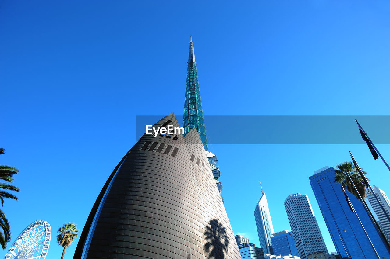 Low angle view of the bell tower in downtown against clear sky