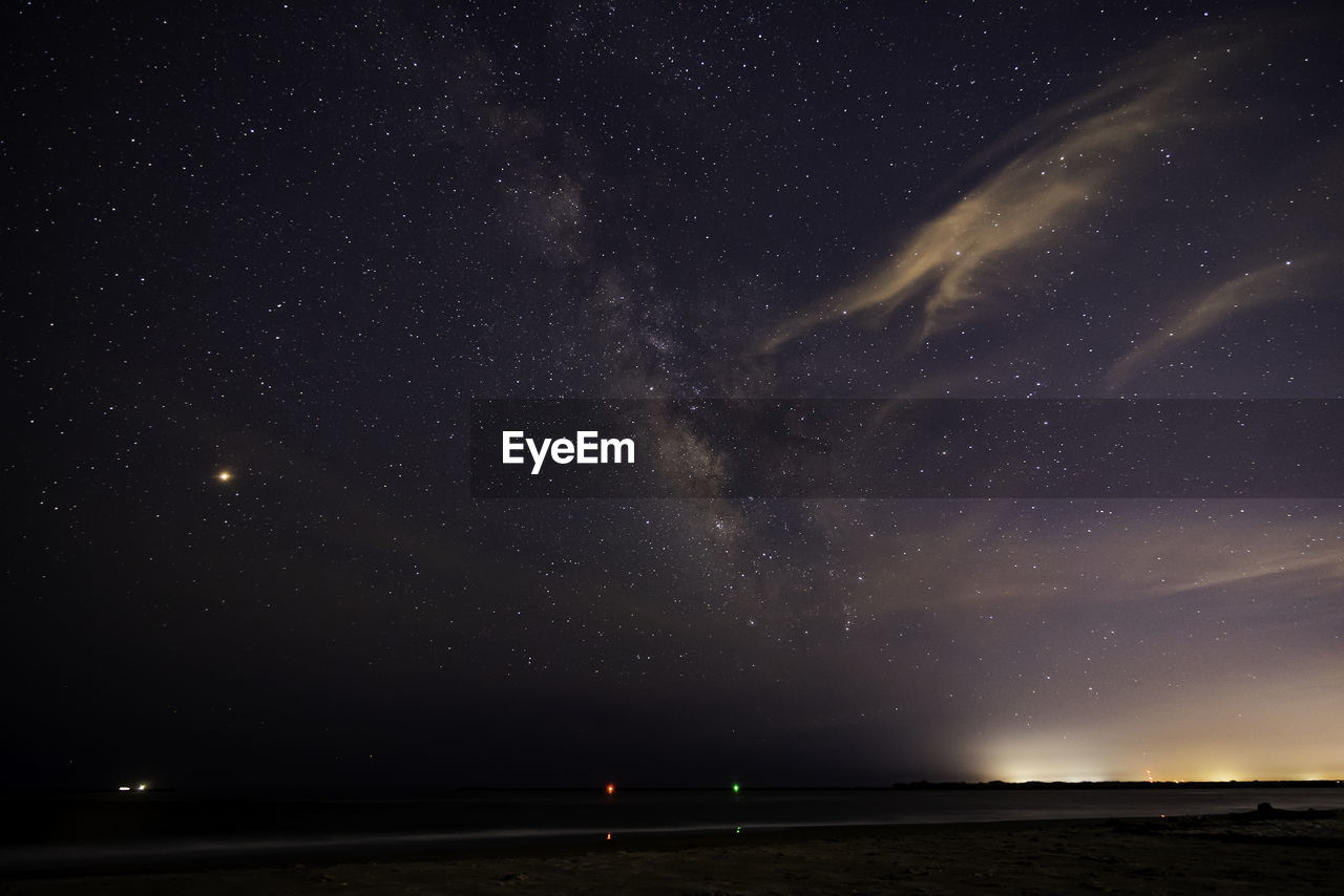 STAR FIELD AGAINST SKY AT NIGHT