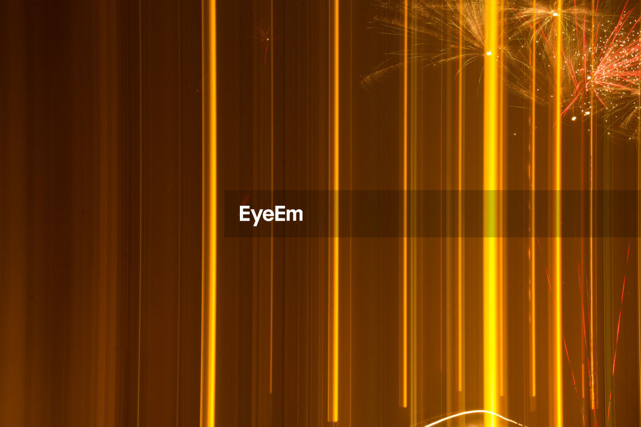 CLOSE-UP OF ILLUMINATED YELLOW