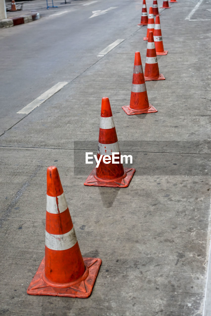 Traffic cones on street in city