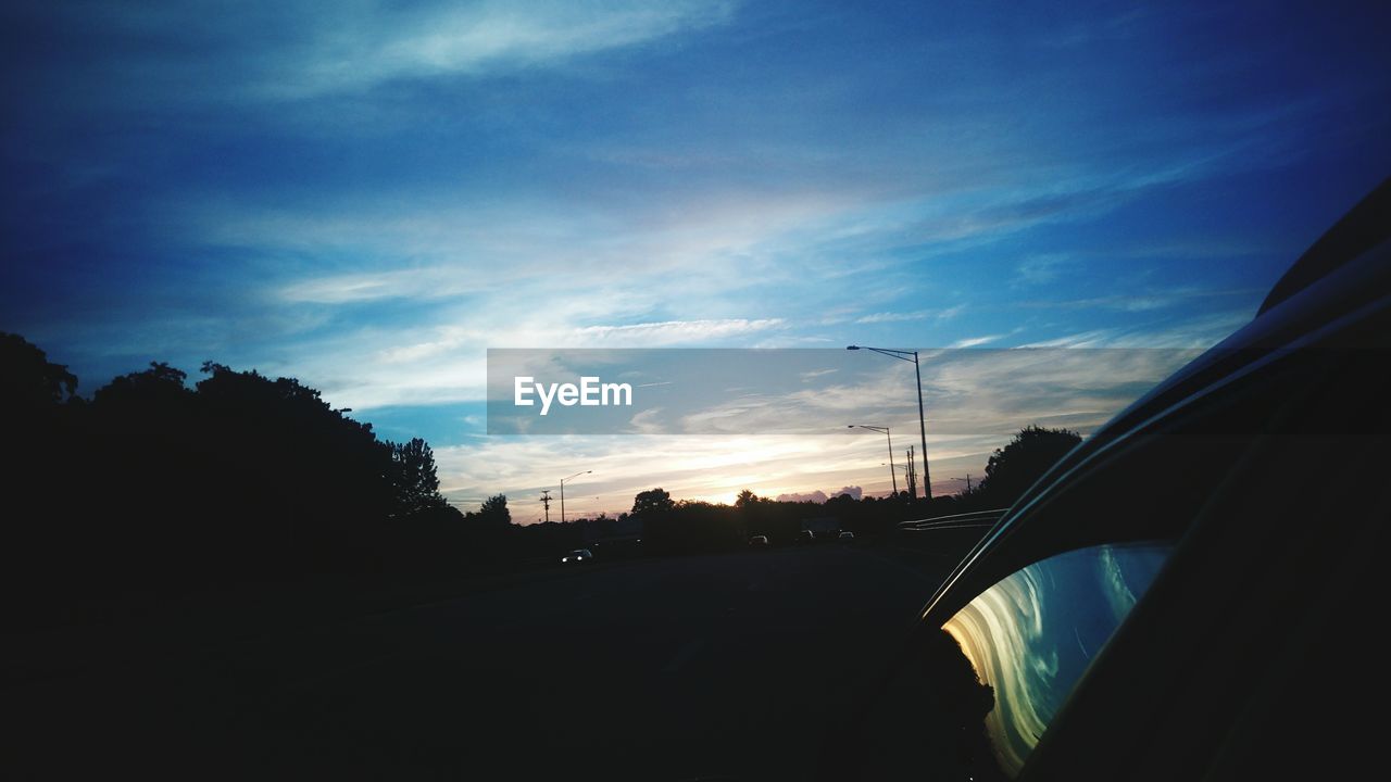 VIEW OF ROAD AT SUNSET