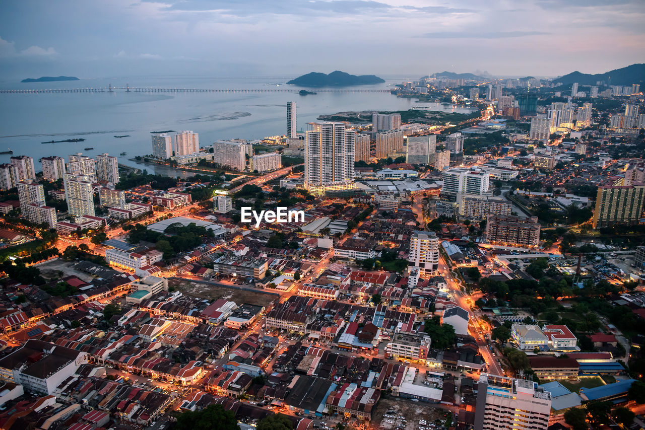 Aerial view of cityscape against sky