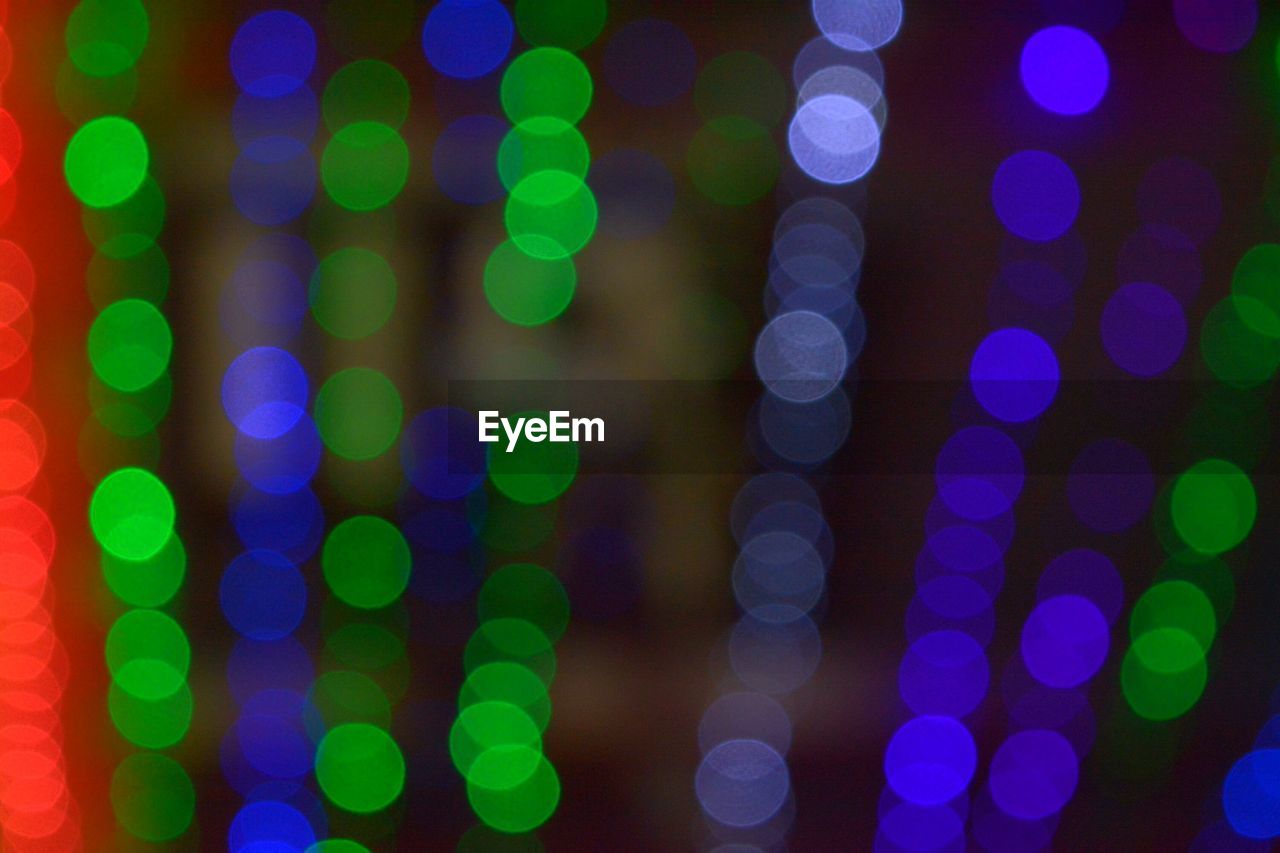 DEFOCUSED IMAGE OF CHRISTMAS LIGHTS