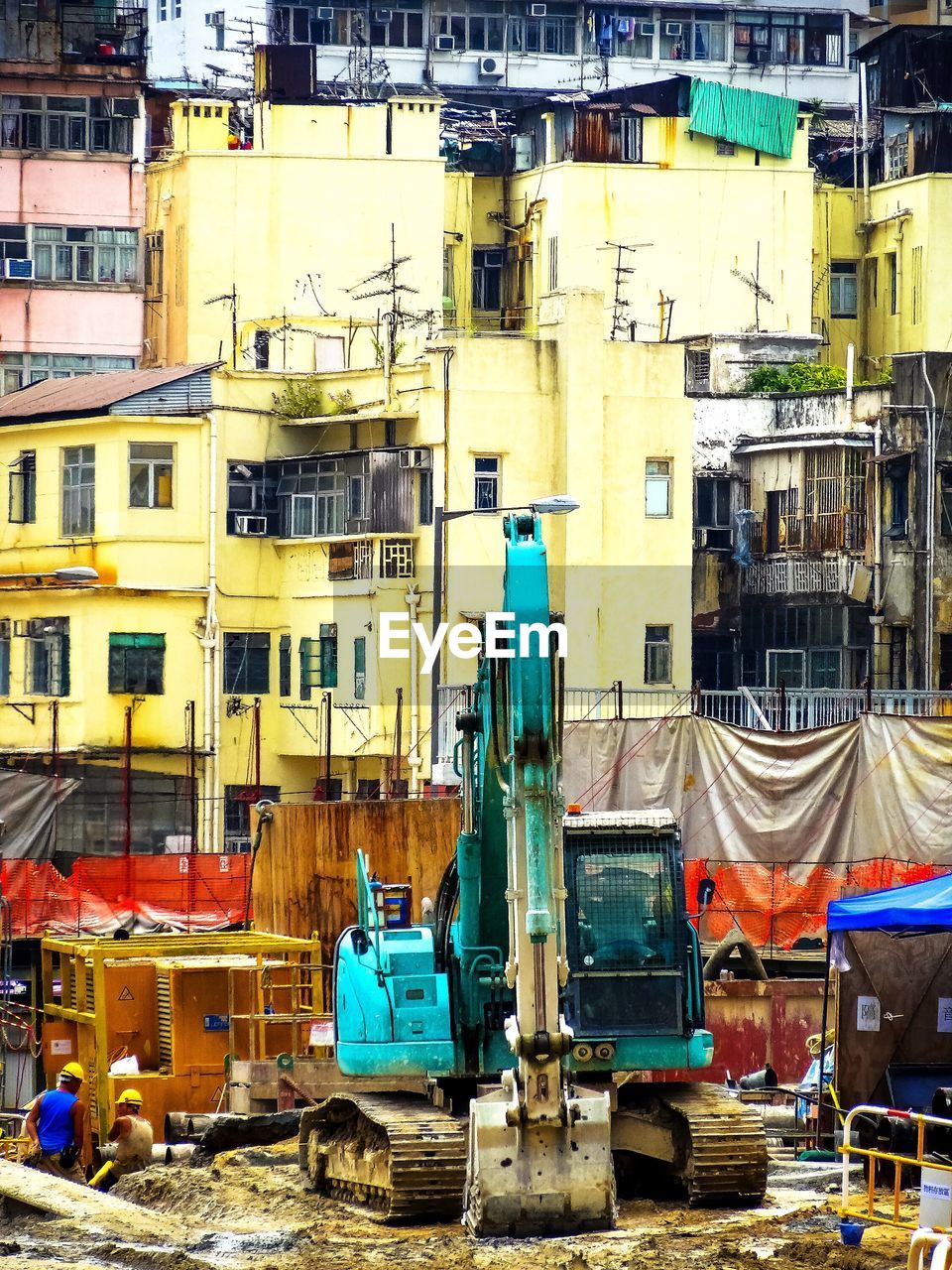 Earth mover at construction site in city