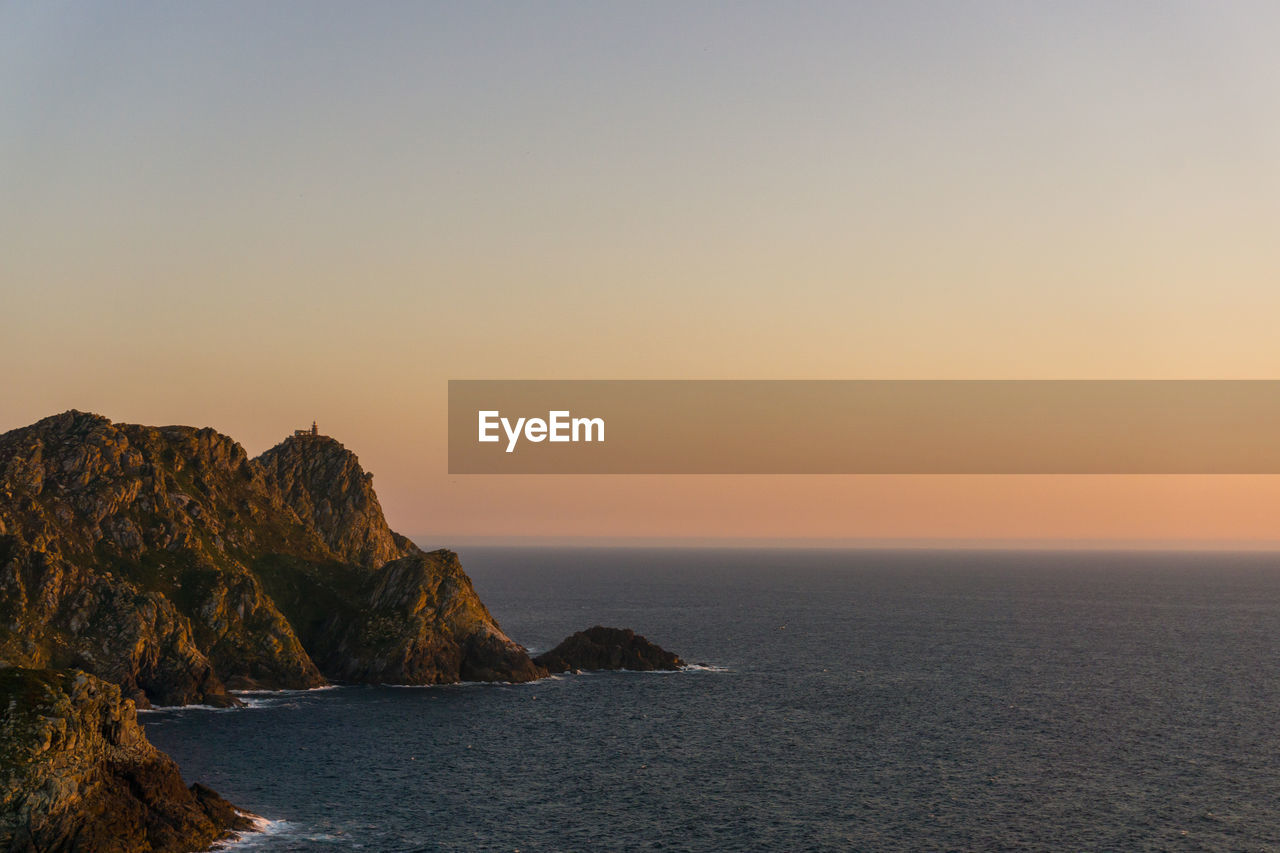 Scenic view of sea against clear sky during sunset in cíes islands, vigo, pontevedra, galicia 