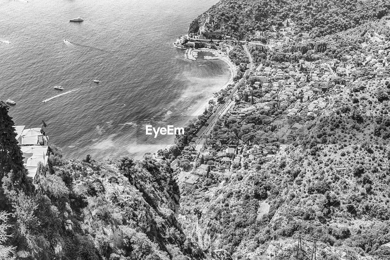 water, high angle view, sea, beach, land, aerial photography, day, nature, beauty in nature, scenics - nature, coast, no people, tranquility, tranquil scene, outdoors, black and white, plant, monochrome photography, monochrome, non-urban scene, sports, rock, tree, idyllic