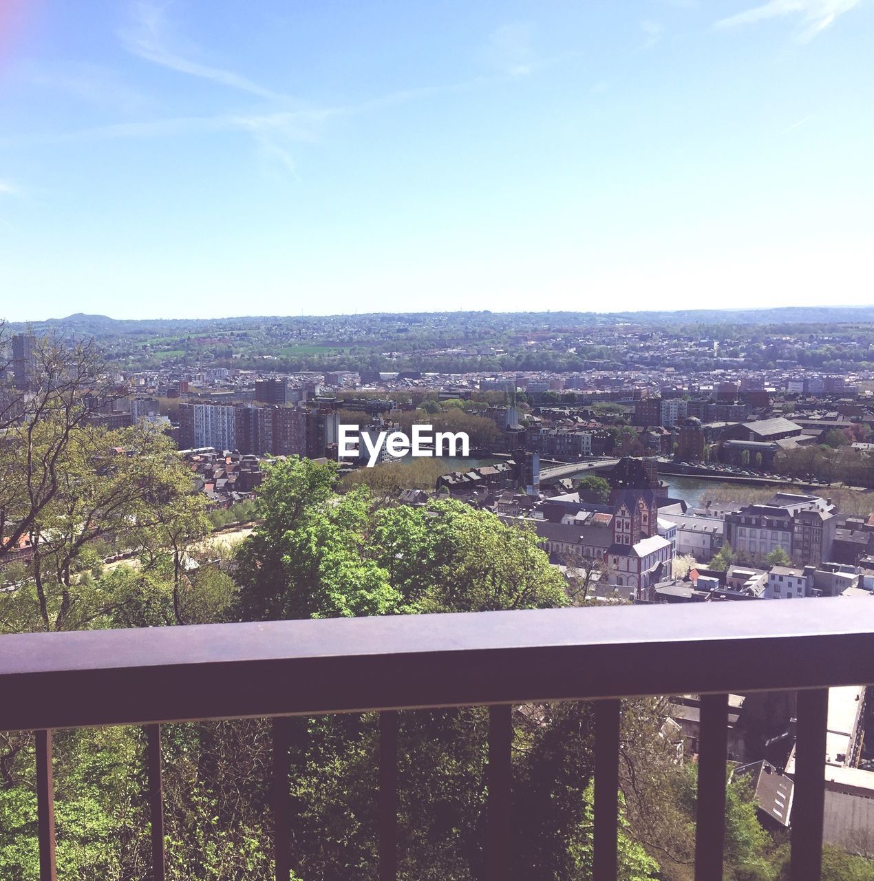 High angle view of trees and buildings against sky