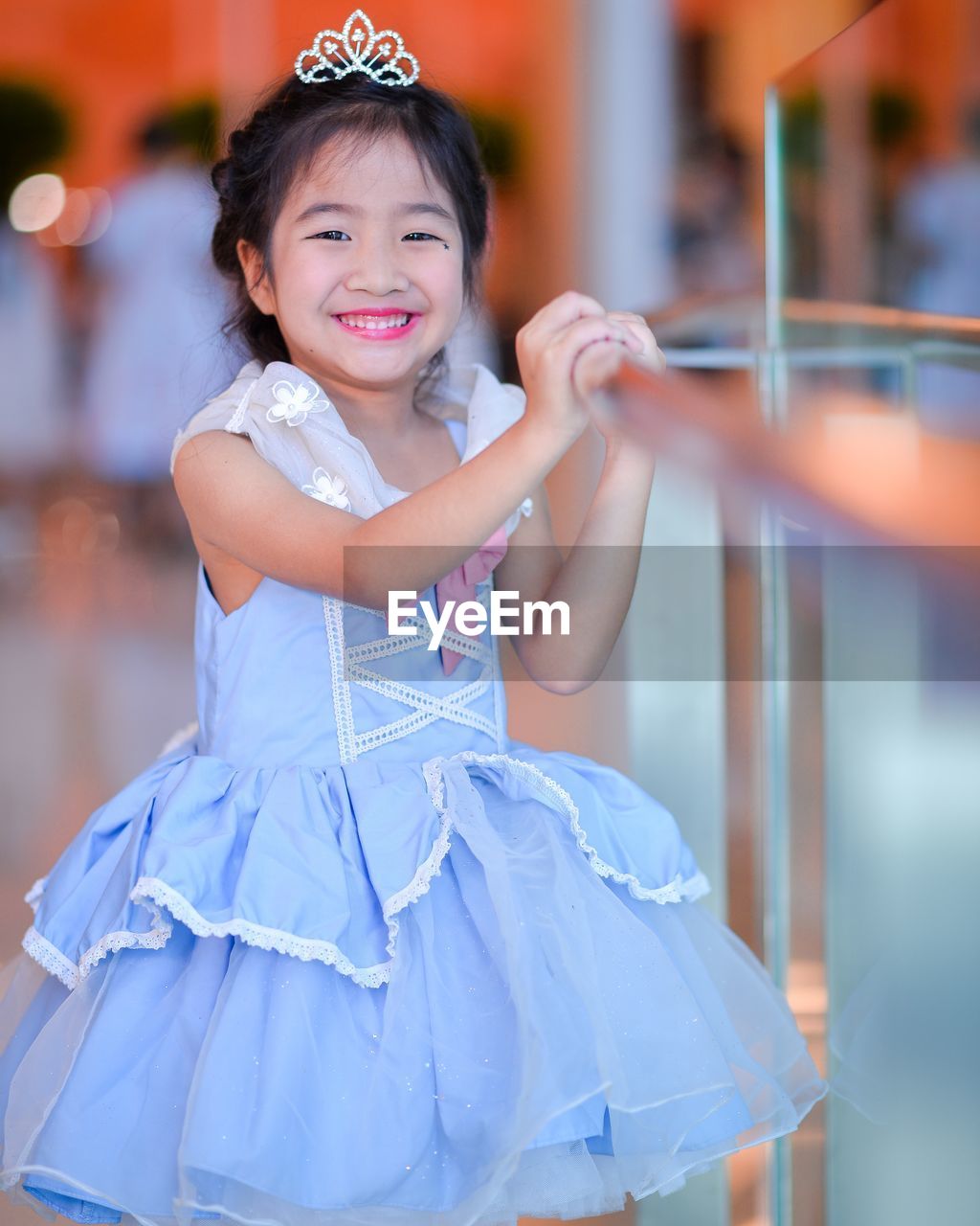 EyeEm Selects Fashion Smiling Looking At Camera Portrait Beauty Arts Culture And Entertainment Girls One Person Child Beautiful People Happiness Outdoors People Cheerful Blue City Children Only Glamour Adult Day