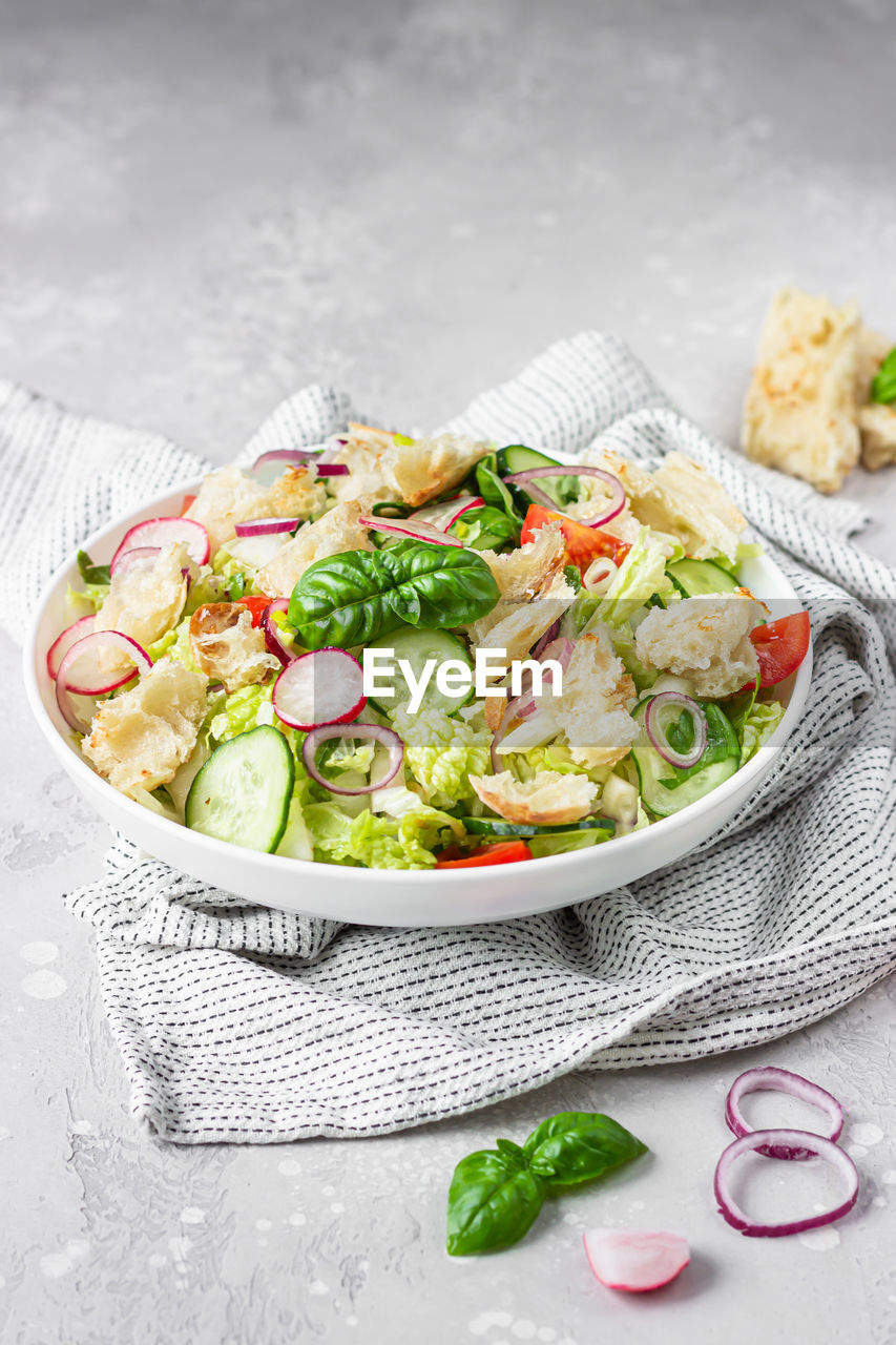 Vegetarian fattoush salad. middle eastern salad with pita bread and vegetables. lebanese cuisine. 