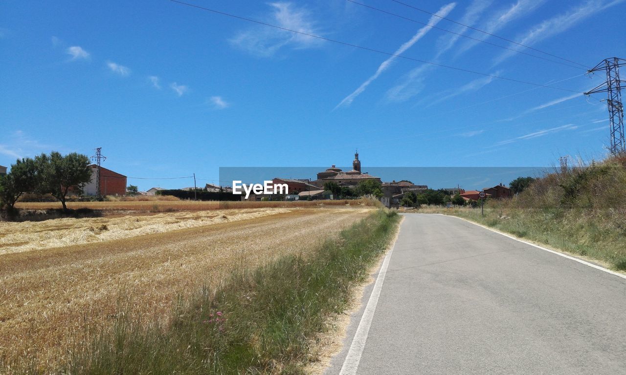 View of road against cloudy sky