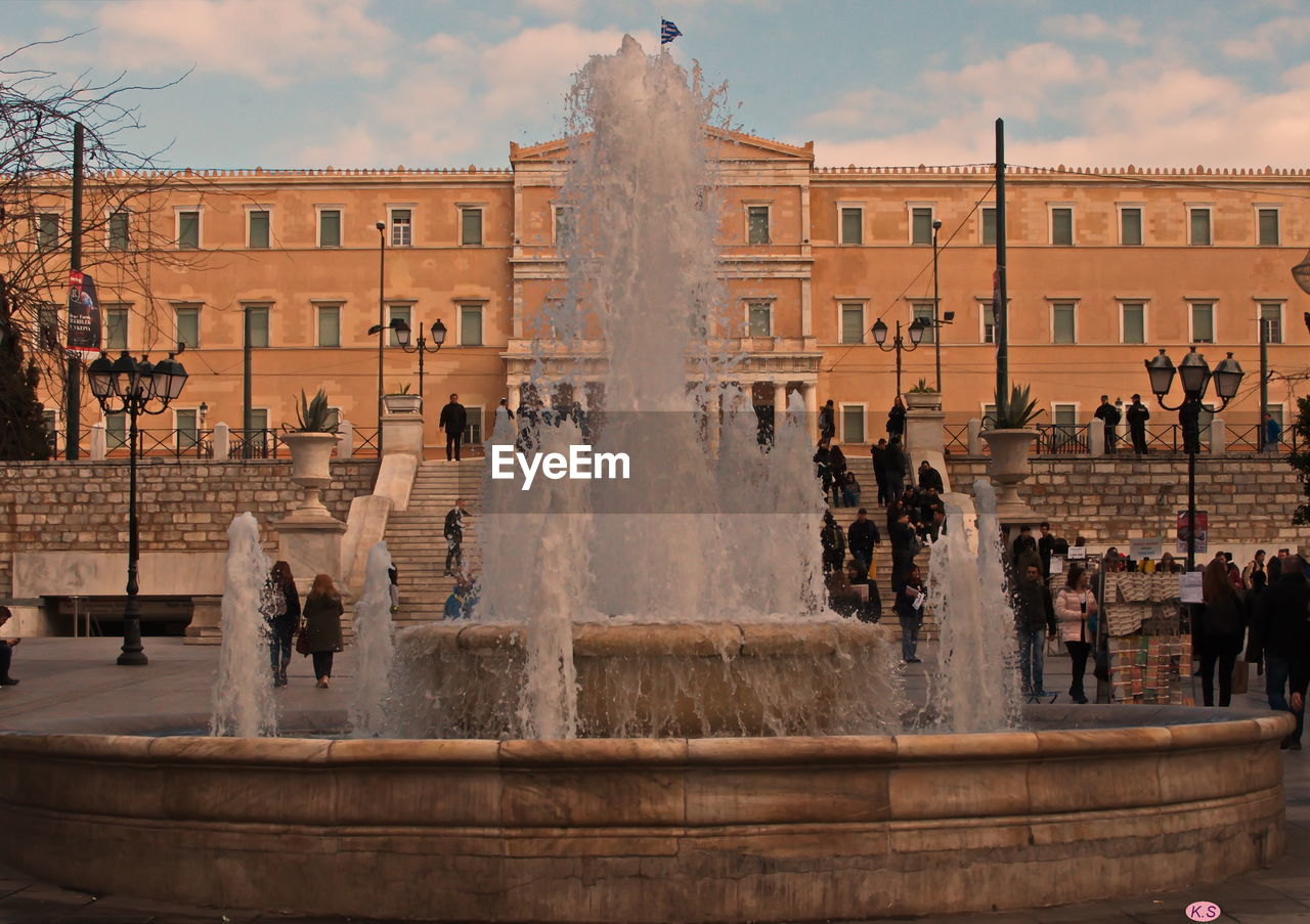 FOUNTAIN IN FRONT OF BUILDING