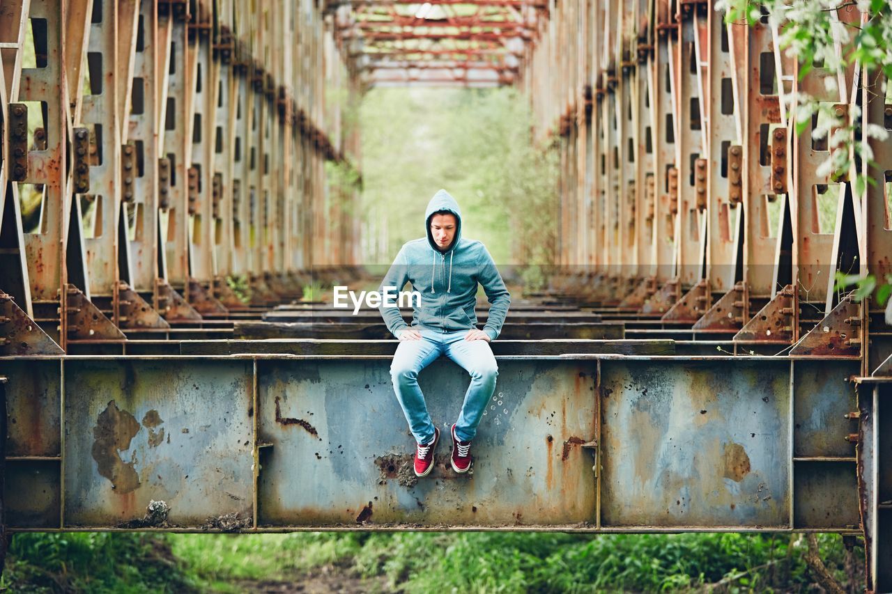 Portrait of man sitting outdoors