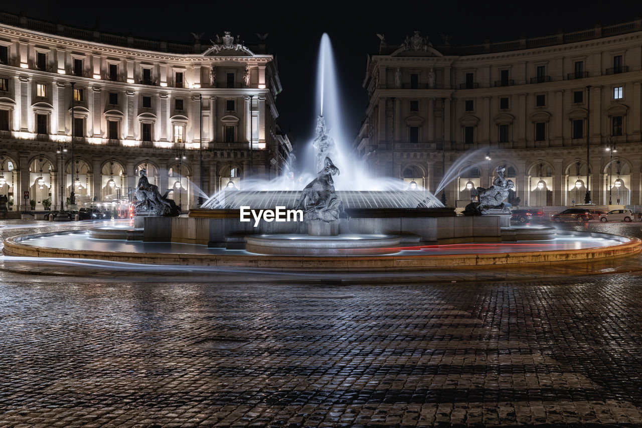 The majestic fountain of the naiads photographed at night with a long exposure.