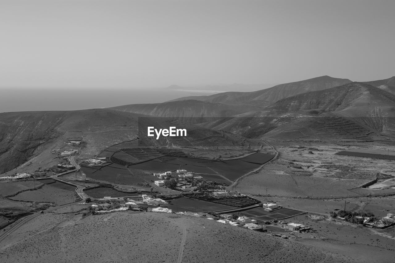 High angle view of mountains against clear sky