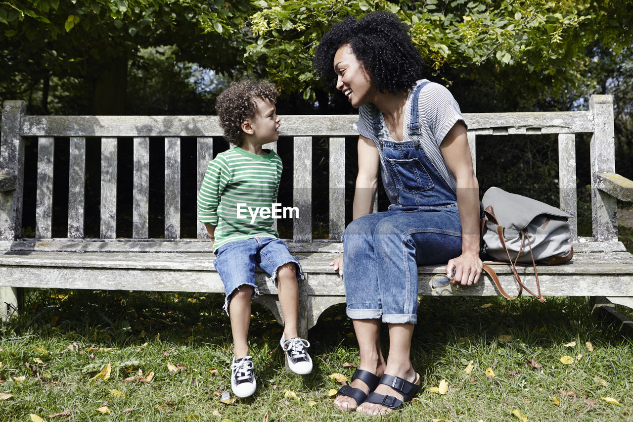 Mother and son on bench