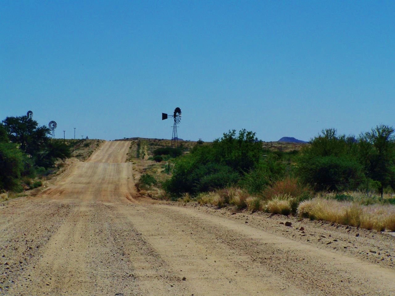 ROAD AGAINST CLEAR SKY