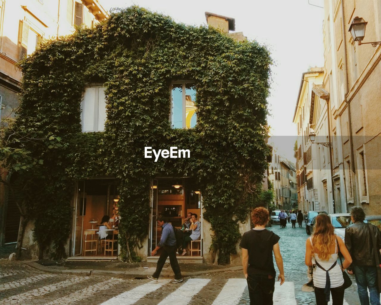 WOMAN WALKING IN CITY