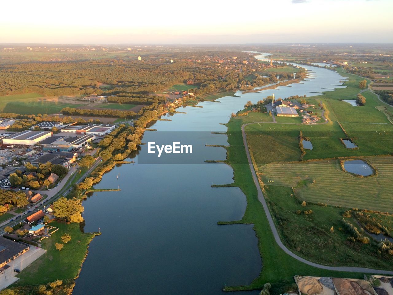 High angle view of river amidst buildings in city