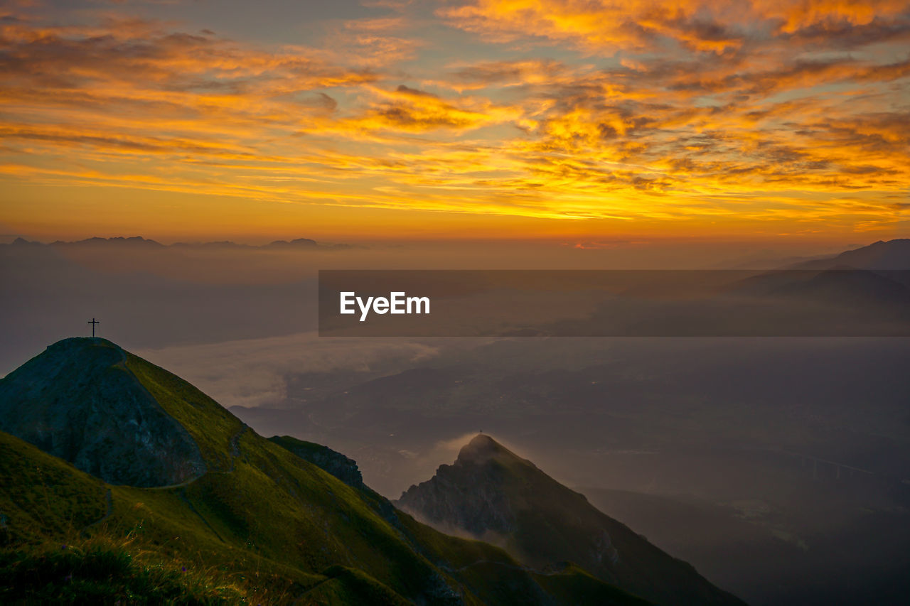 Scenic view of mountains against sky during sunset