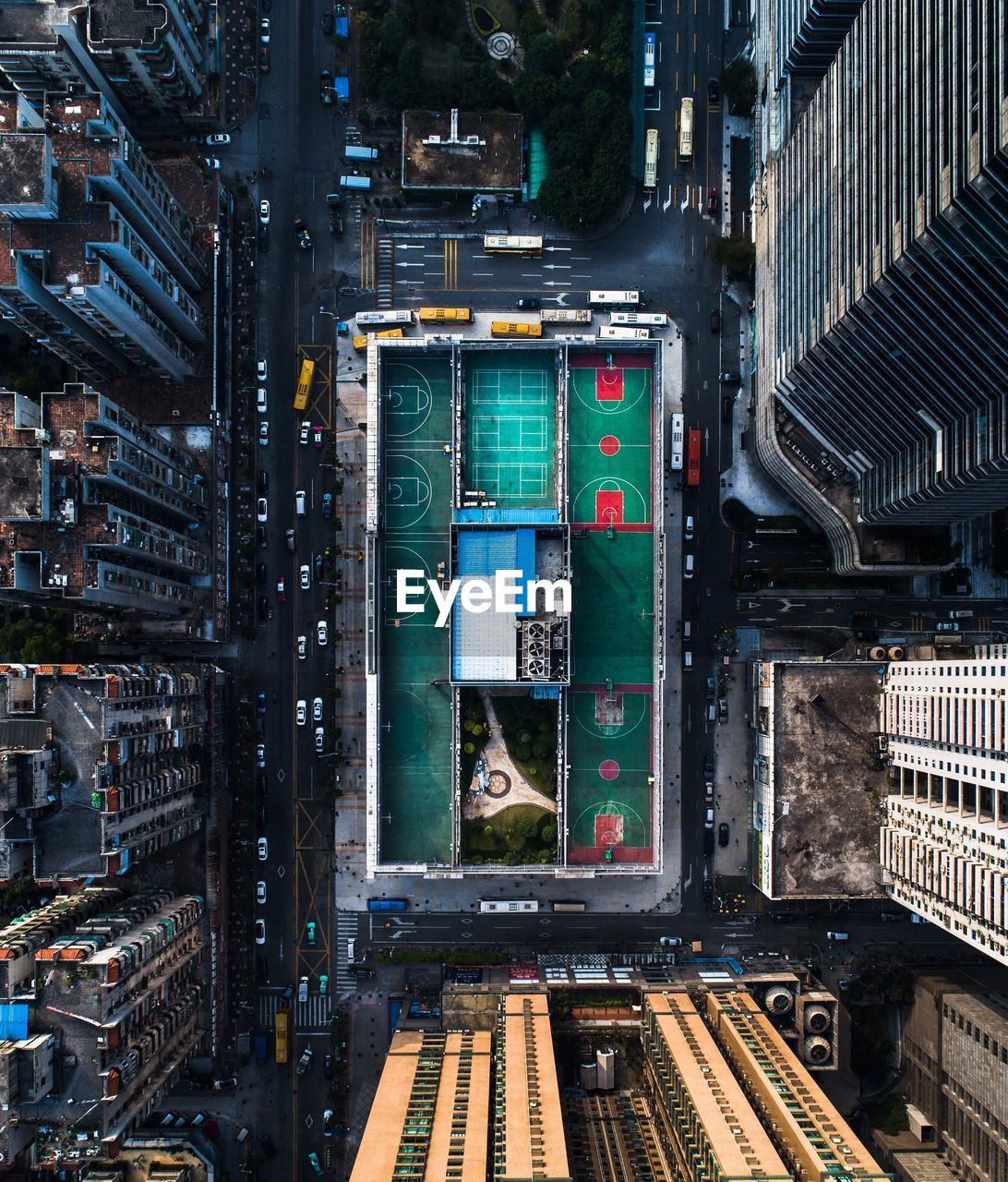 Directly above shot of stadium amidst buildings in city